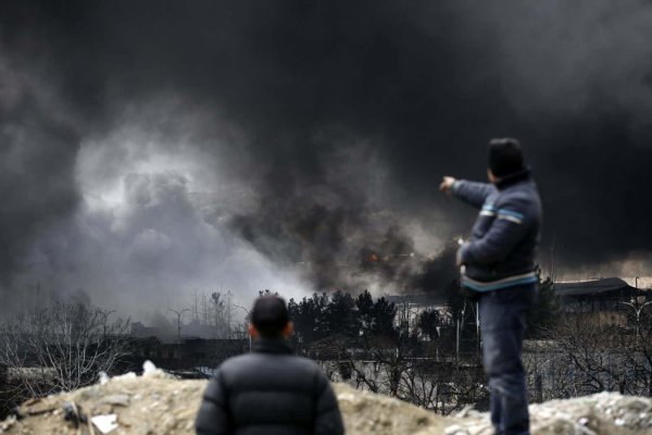 Black rain falls on Tehran after oil facility strikes; smoke raises health concerns